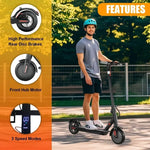 Fast long range electric scooter without seat in a park with person riding it wearing a helmet.