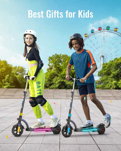 Kid's RGB Electric scooter on concrete with lights on E-scooter frame rails lit